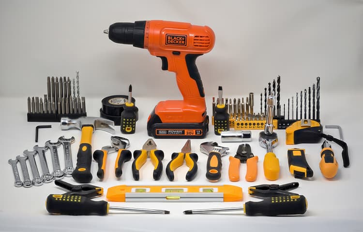 A laid-out kit of electrical and general repair tools